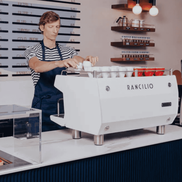 Rancilio Invicta espresso machine on a café counter