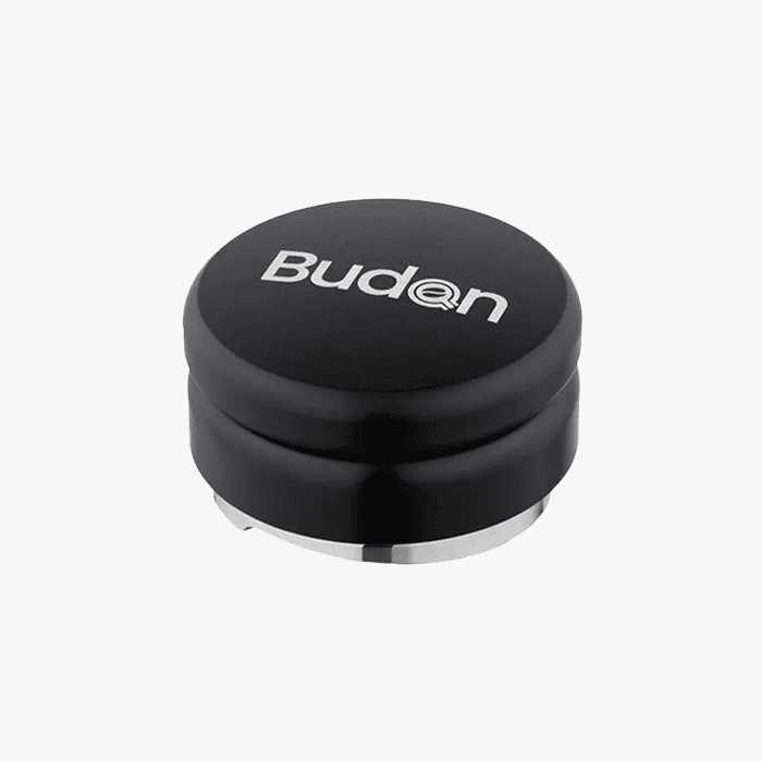 Budan coffee distributor tool leveling espresso grounds in a portafilter basket