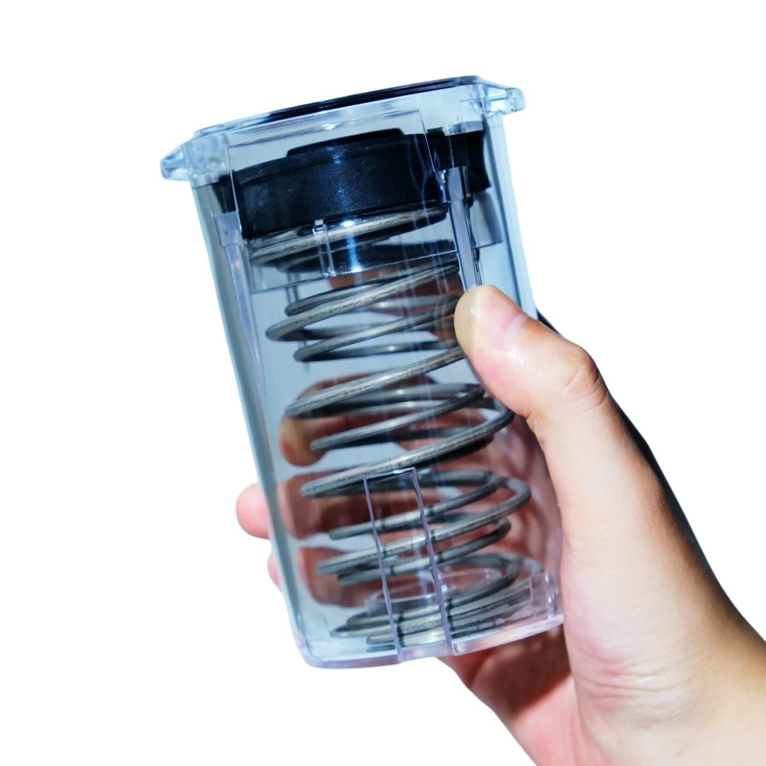Mischief Espresso Machine Cleaning Device Spring Clean espresso machine cleaning device with transparent reservoir on a 58mm portafilter