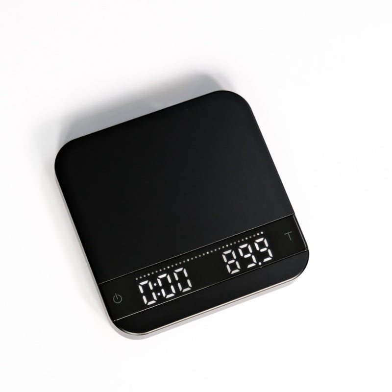 MisChief Lunar precision coffee scale on an espresso counter