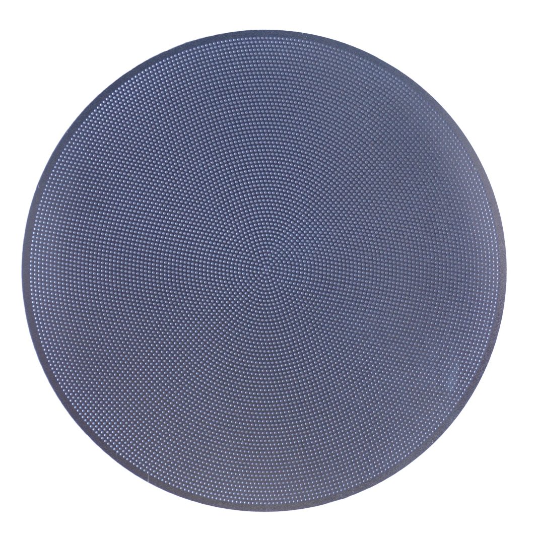 Mischief espresso puck screen fine placed on top of 58mm coffee puck