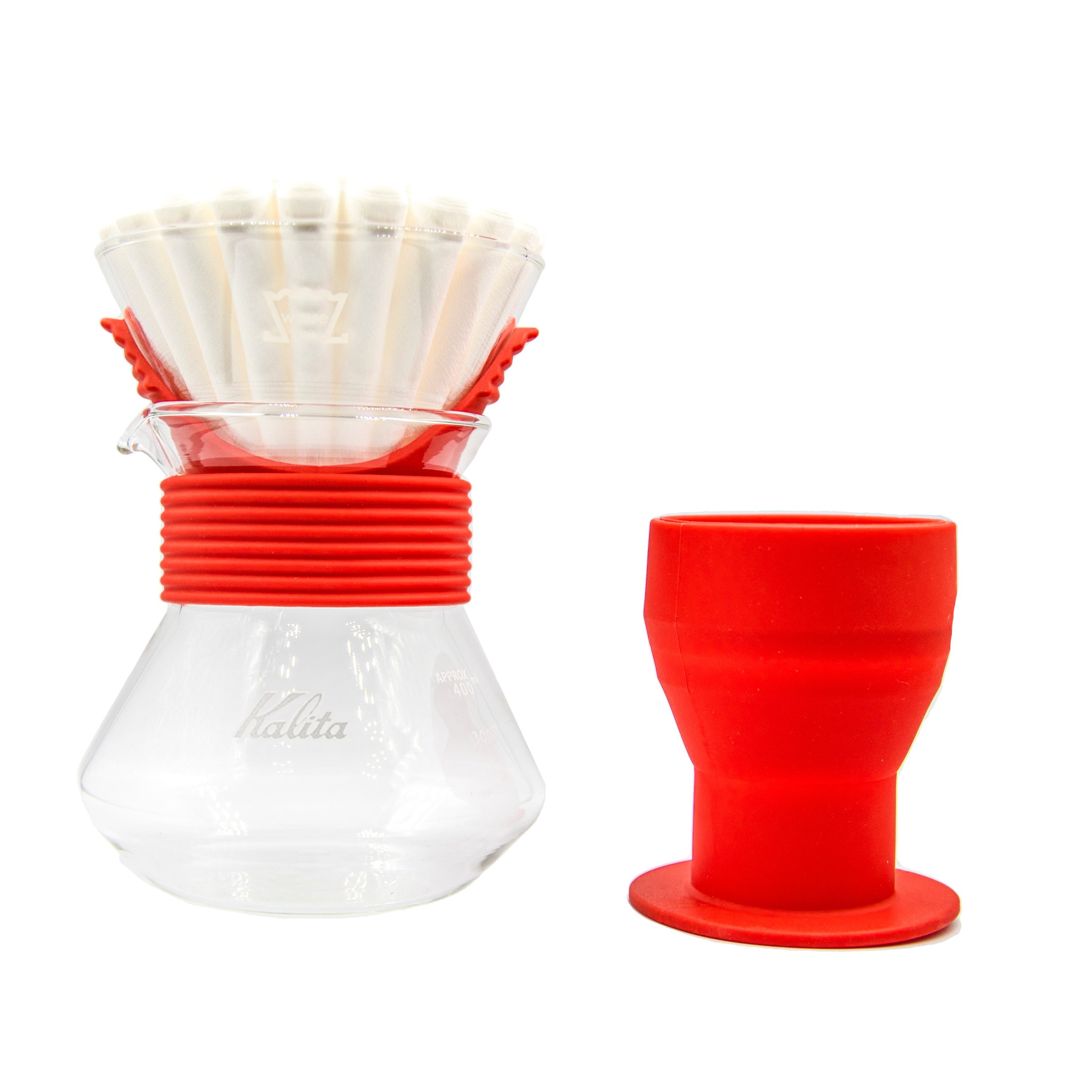 Kalita Wave Style Up 185 Kalita Wave pour over set with glass dripper and server on a wooden counter