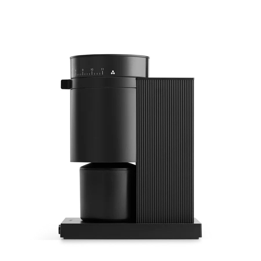 Fellow Opus Conical Burr Grinder Fellow Opus grinder with conical burrs on kitchen countertop