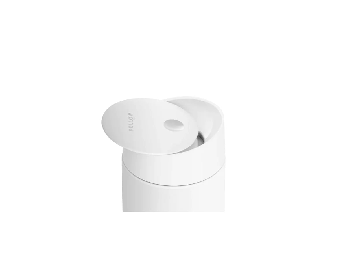 The Slide Lid - Fellow Fellow Slide-Lock Lid in black fitted on a Carter Move Mug