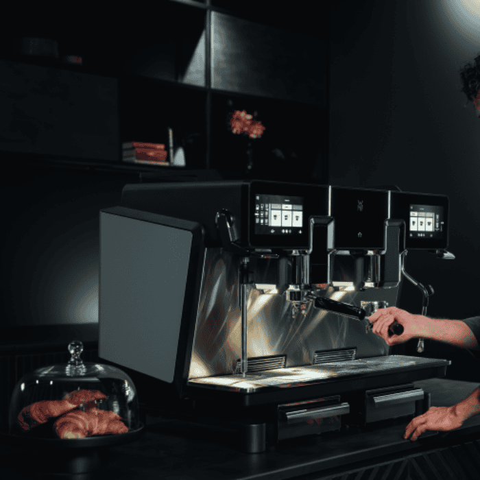 WMF Espresso NEXT automatic espresso machine on a café counter