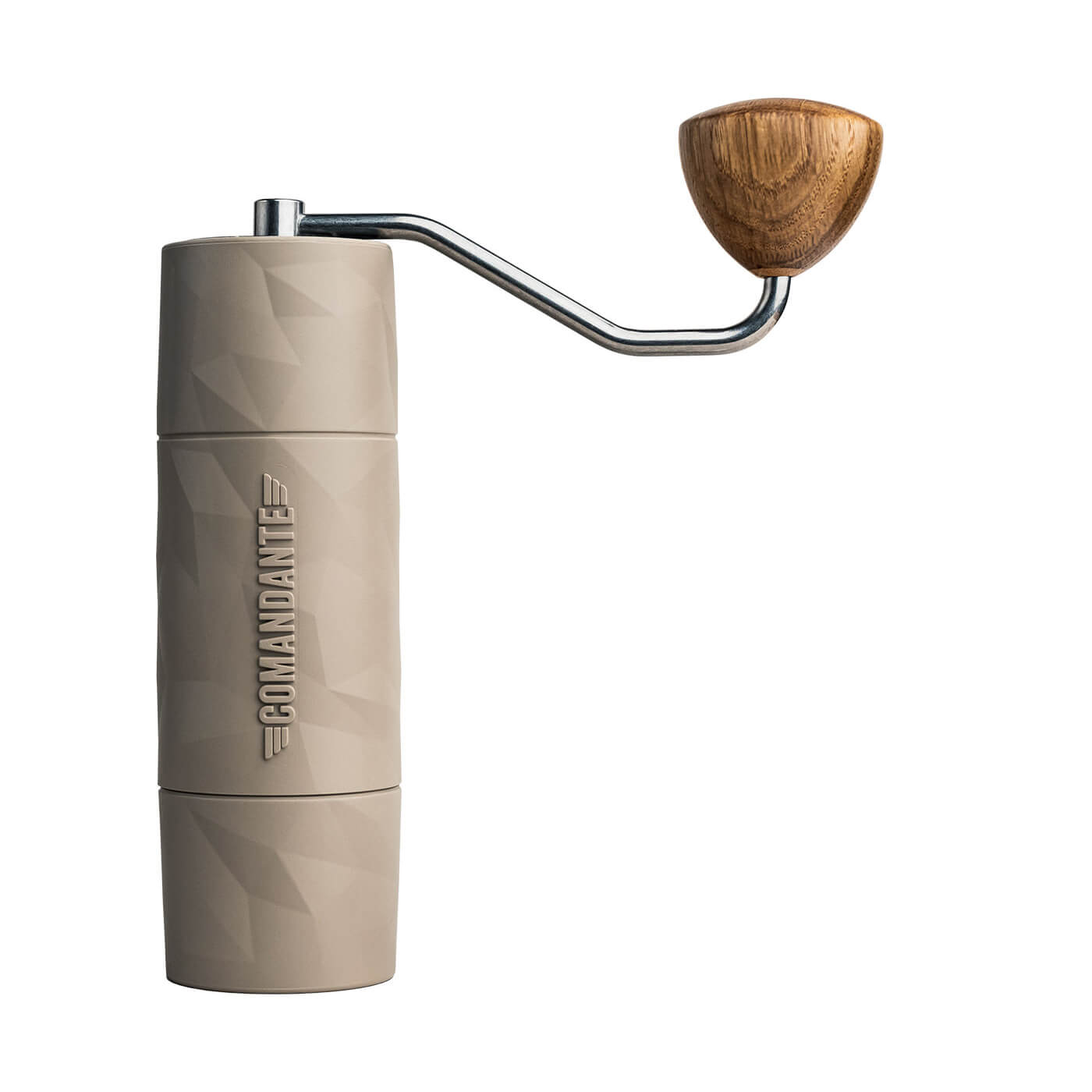 Comandante X25 Trailmaster Dune manual coffee grinder on a wooden counter