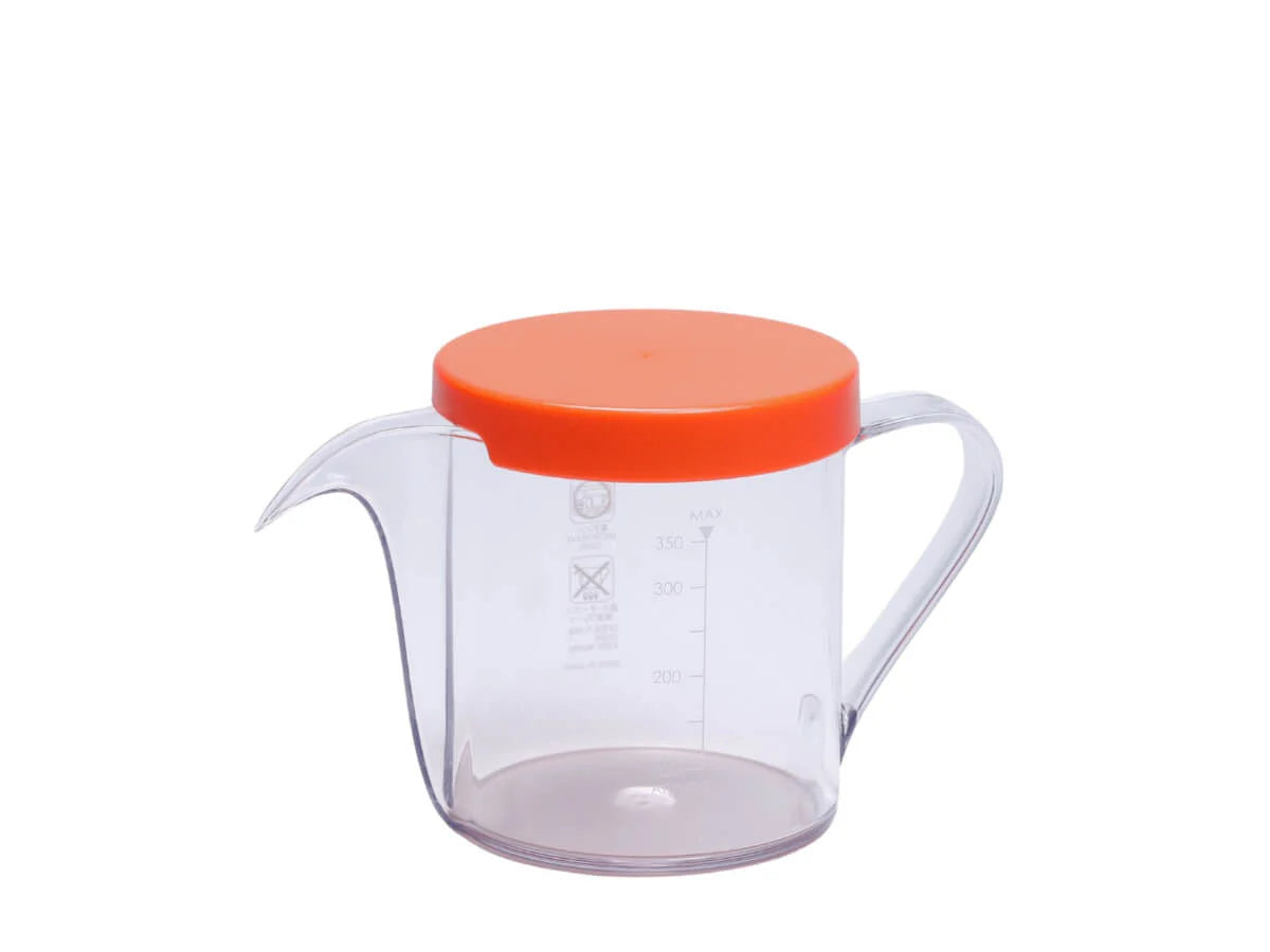 CAFEC drip kettle Osmo with orange lid on brewing counter