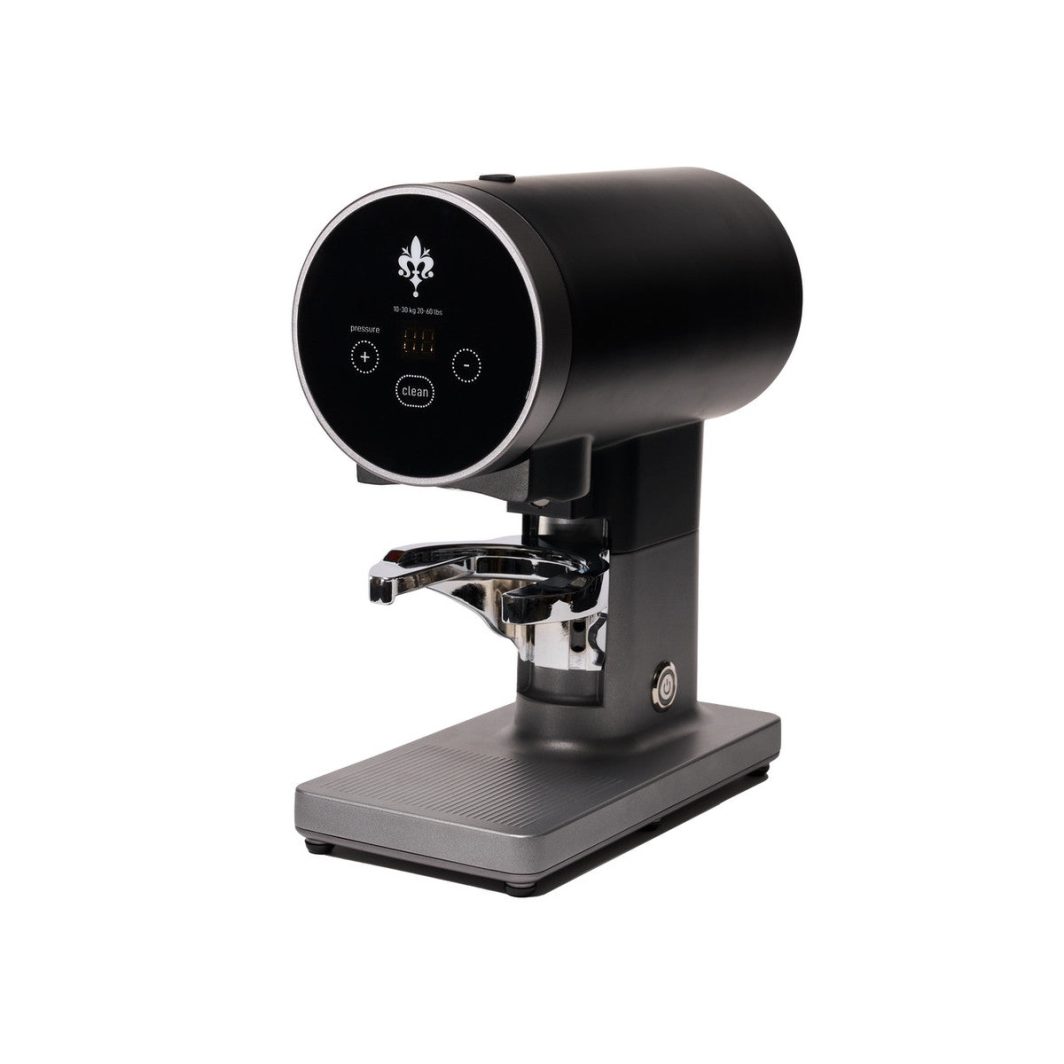 Eureka Disko Tamper automatic espresso tamping station on café counter