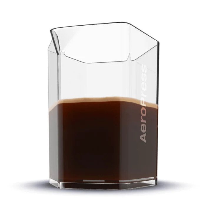Aeropress Carafe AeroPress carafe with hexagonal body on a brewing counter